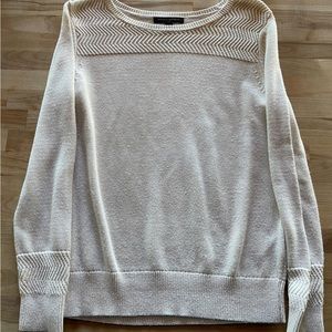 Small cream woman’s sweater